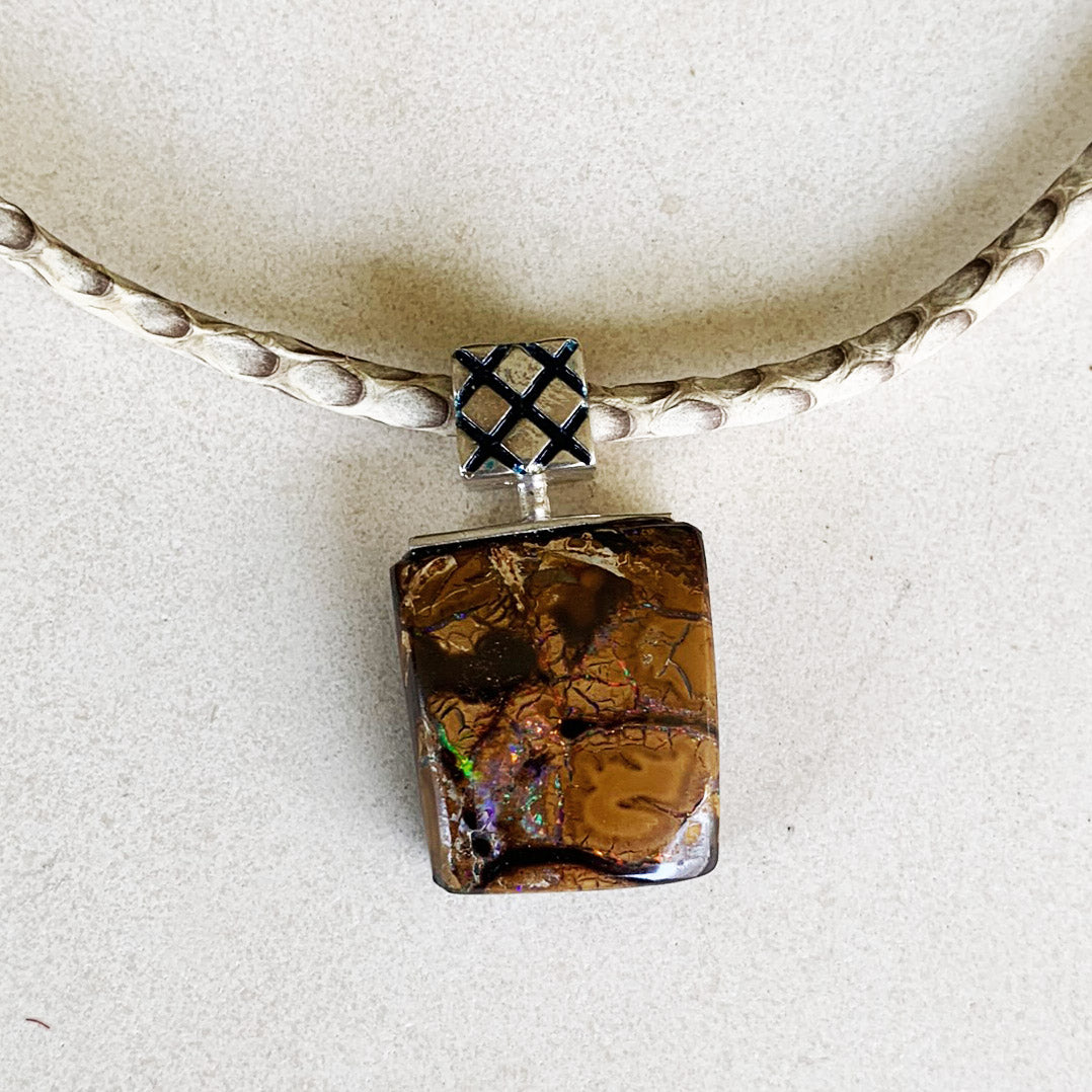 Boulder opal pendant on white python leather pendant